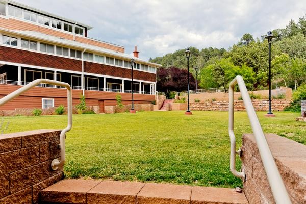 A view of the front lawn with Goodfellow Lodge in the background