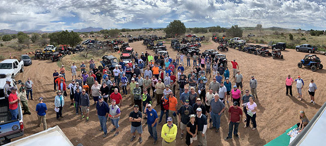 A crowd of people ready to go out on a Show Me OHV ride with Arizona State Parks