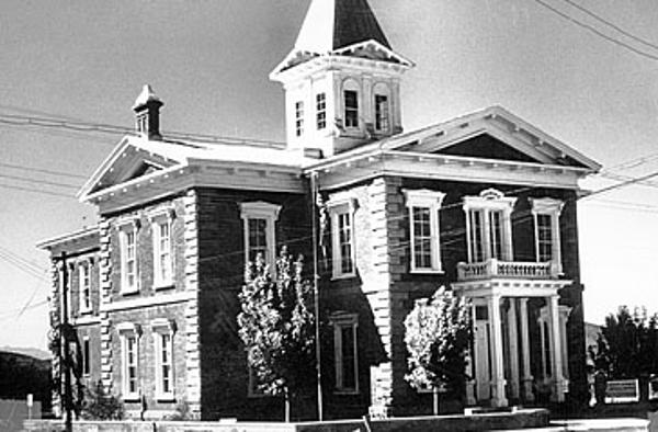 A black and white photo of Tombstone Courthouse