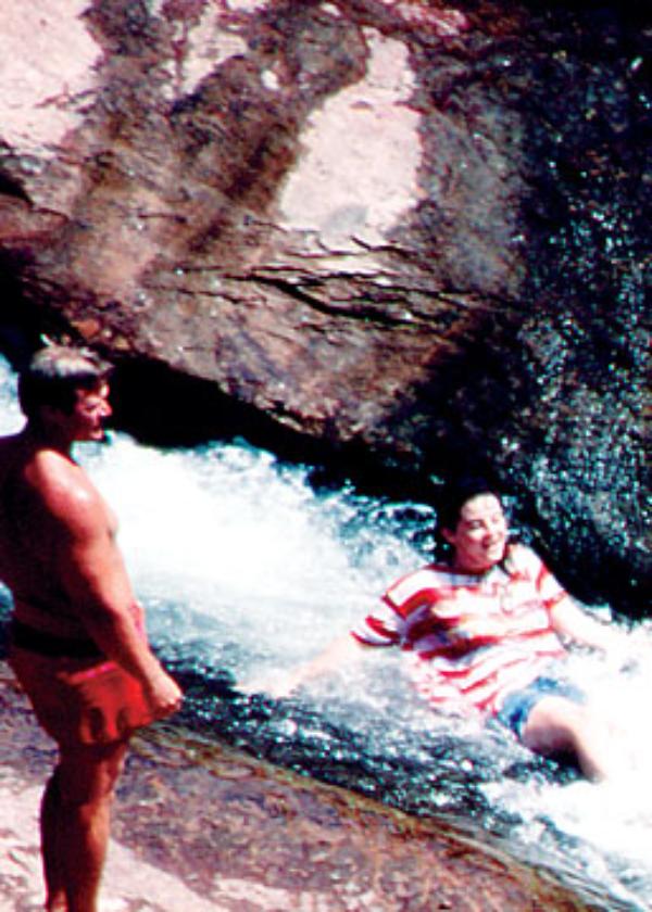 A visitor enjoys the slide in 1986