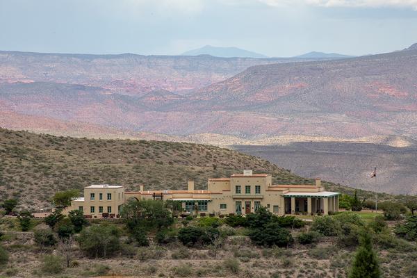 The Douglas Mansion is a great historic site in Jerome, AZ with a view of the town on the hill and mining equipment.